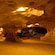 Sunlight peeks through ceiling openings in an underground cavern at Jamaicas Green Grotto Caves